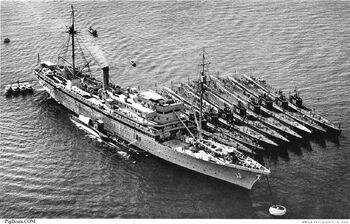 Tender Holland and a nest of submarines