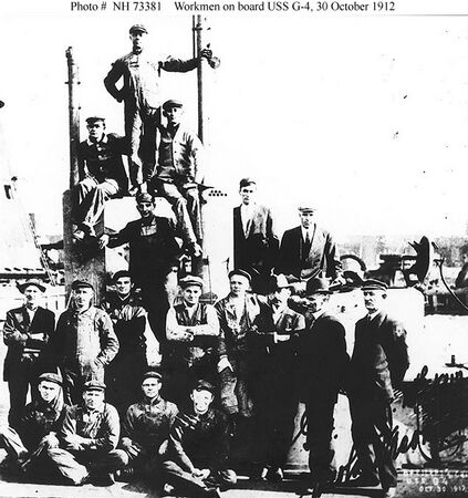 A few of the workmen from the Cramp Ship Yard that built the USS G-4. Seen are yard officials, shop and department supervisors and the craftsmen who were putting the G-4 together. Commissioning was still 14 months away.