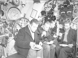 T-3 men eating control room.jpg